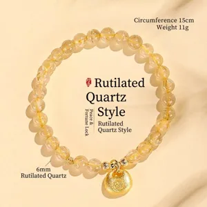 Elegantes goldenes Rutilquarz-Armband mit einem symbolischen goldenen Segensschloss-Anhänger