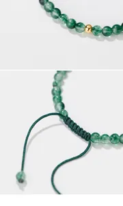 Macro view showing the detailed adjustable knot and polished green moss agate beads