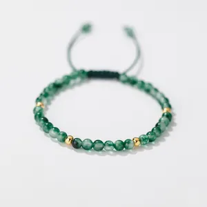 Adjustable green moss agate beaded bracelet with gold accents for women