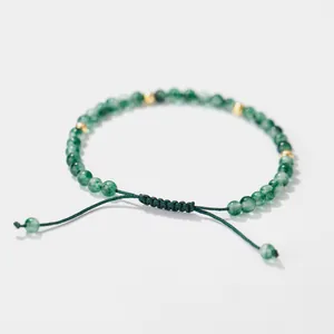 Minimalist moss agate beaded bracelet with adjustable green cord and gold accents
