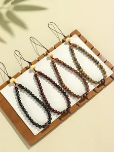 Bijoux de téléphone faits main en perles de bois de santal et lotus pour vos sacs