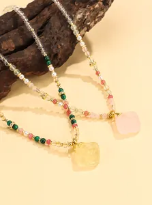 Detailed view of New Chinese style beaded necklaces with carved square stone pendants
