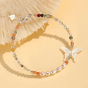 Elegant handmade multi-color crystal and freshwater pearl bracelet with white butterfly charm