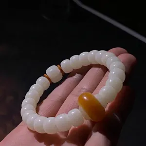 Braccialetto artigianale in radice di bodhi giada bianca con perle tonde lisce unisex