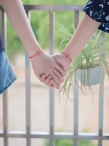 Minimalist handmade red string bracelet with natural strawberry quartz bead for best friends