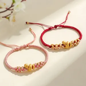Bracelets en corde tressée rouge et rose avec breloques serpent dorées pour l'année du serpent