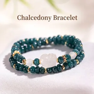 Double-layered teal chalcedony bead bracelet with white jade fox carving
