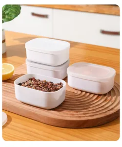 White 100g food storage containers for meal prep, grains shown in an open box.