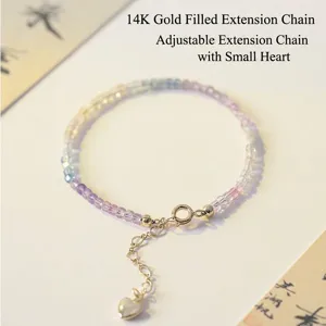 Dainty 2mm rainbow fluorite bead bracelet with 14k gold-filled heart extension