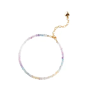 Delicate 2mm rainbow fluorite bead bracelet with 14k gold heart charm.