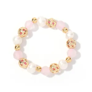 Elastic natural freshwater pearl and pink crystal ring with gold filigree beads