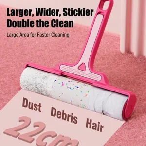 Extra-wide 22cm pink tear-off lint roller for pet hair and dust removal from rugs.