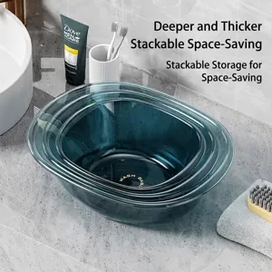 Stackable thickened transparent plastic washbasins in a bathroom setting