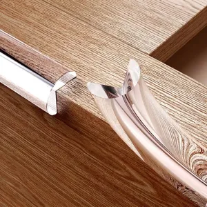 Transparent edge protector strip for child safety on furniture corners and tables