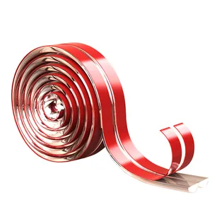Chrome baby proofing edge protector with red adhesive backing in a coil
