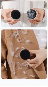 Detail showing laundry ball effectively removing lint from a brown wool coat.