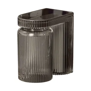 Modern dark gray fluted wall-mounted toothbrush holder with transparent mouthwash cup