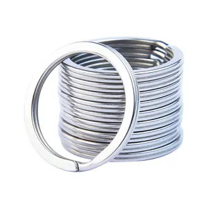 A stack of premium circular 304 stainless steel key rings for DIY keychain crafts