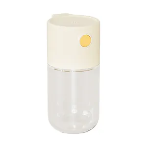 Minimalist quantitative glass salt shaker with beige push-button lid for kitchen