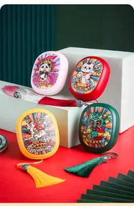 Portable electric hand warmers with festive cartoon illustrations and tassels