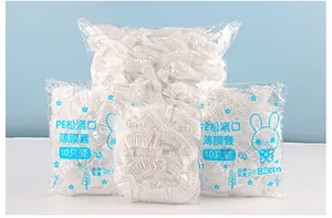 Detailed view of disposable PE dust covers with elastic openings in 10-piece packs