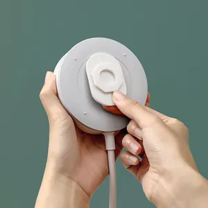 Minimalist white adhesive power strip fixer for punch-free wall mounting and organization