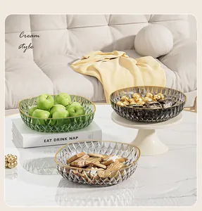 Luxury diamond texture plastic fruit bowls with gold rim on marble coffee table