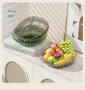 Close-up detail of luxurious diamond textured plastic fruit bowls in modern cream style home.