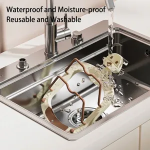 Multifunctional dog-themed kitchen pot lid rack being washed in a stainless steel sink