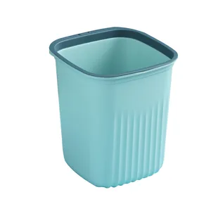 Modern light blue square trash can with vertical striped texture and dark grey rim
