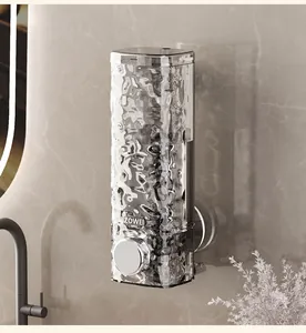 Detail view of wall-mounted soap dispenser featuring an elegant water ripple texture finish