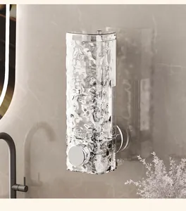 Detailed view of the elegant water-ripple texture on this wall-mounted soap dispenser
