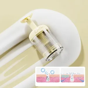 Portable manual foam maker for facial cleanser and body wash in a soft yellow design