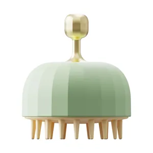 Professional mint green silicone scalp massager brush with gold handle for shampooing