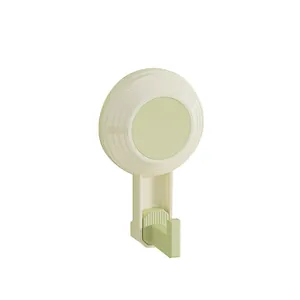 Modern light green suction cup wall hook for bathroom and kitchen towel organization.