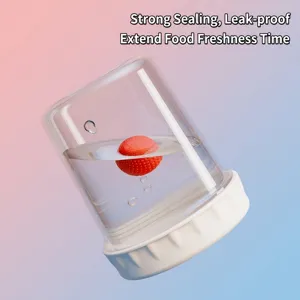 Portable clear fruit cup with sealed white base for leak-proof storage