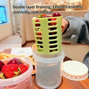 Portable fruit cup with green drainage basket and clear leakproof container for picnic