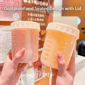 Portable leak-proof fruit salad cup with built-in fork and drain basket for picnic use
