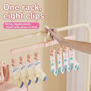 Tragbarer rosa Reise-Klappbügel mit 8 Clips für Socken und Unterwäsche zum Wäschetrocknen