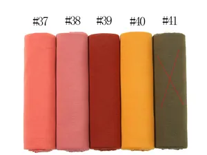 Opzioni di colore per la sciarpa turbante in jersey di cotone mercerizzato tinta unita.