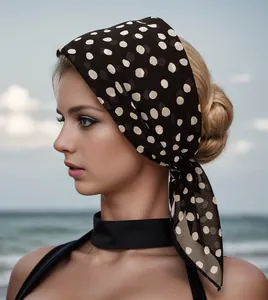 Elegant vintage chiffon polka dot square scarf tied as a stylish hairband on a woman