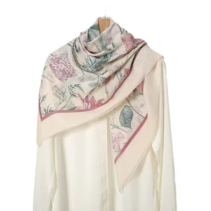 Elegant floral printed square scarf with scalloped laser-cut edges on white background