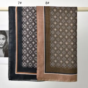 Detailed view of high-quality printed polyester square scarves with elegant floral patterns