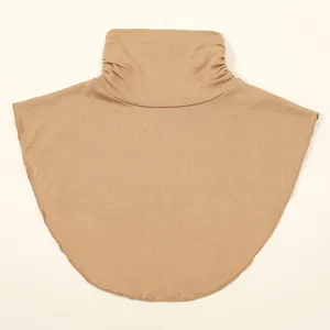Detailed macro view of the soft beige knit mock neck dickey collar accessory for women