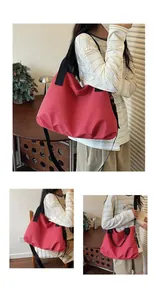 Detailed views of a large red grid nylon tote bag styled as a shoulder and crossbody bag