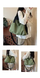 Model showcasing a large capacity green checkered nylon tote bag in a lifestyle setting.