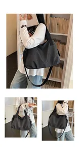 Large capacity checkered nylon tote bag for women shown in lifestyle commuter setting