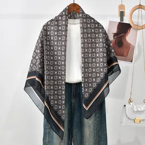 Detail view of vintage geometric print polyester square scarf for women