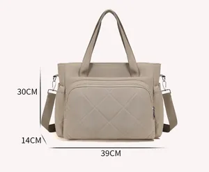 Diamond quilted diaper bag dimensions 39x14x30cm for travel and nursery