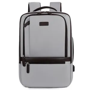Professionele grijze zakelijke laptoptas van waterdicht nylon met bruine accenten